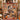 Holding a personalized pumpkin patch photo blanket with custom family name