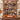 Personalized pumpkin patch photo blanket with six family photos displayed on a wall