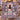 Holding a personalized Pumpkin Stack Black Cat woven blanket with custom names woven in