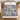 Personalized The Unhurried Chapter blue toile woven blanket spread across a bed