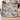 Personalized The Unhurried Chapter blue toile woven blanket held by a couple in a bedroom