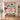Personalized mystery clue quilt hung on a wall with sample family name The Langley Family
