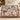 Personalized The Unwritten Alibi mystery clue woven blanket draped over an ivory sofa