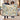 Dad's Brightest Stars woven blanket with Lily, Mason and Sophie on blue-and-ivory ornamental star and floral artwork, held open by a couple indoors.