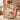 Our Life in Bloom woven blanket with Laura & James and October 12, 2014, framed by pink camellias and cream honeysuckle on a blush background, held open by a couple indoors.