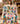 Stitch Hawaiian Christmas personalized fleece blanket held up in a cozy living room