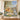 Forever Meadow pet memorial photo blanket hung on a wall with a golden retriever and sample name and years
