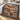 Personalized Ranch Year Patchwork western woven blanket spread across a bed