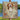 Vintage Floral Damask pet memorial woven blanket with a Beagle photo and the name Charlie, held outdoors by a lake