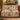Golf Garden Christmas woven blanket draped over a leather sofa by the Christmas tree