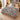 Ornamented Winter Stags Christmas woven blanket spread across a bed in a festive bedroom