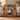 The Garden You Left Behind pet memorial woven blanket with a Shih Tzu photo and the name Teddy, draped over a sofa