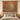Tupelo Coral Canopy autumn forest woven blanket hung as a wall tapestry above a bed