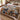 Marshland duck hunting woven blanket spread across a bed in a lodge style bedroom
