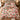 Yuletide Keepsake Patchwork duvet cover set in pink on a bed in a cozy bedroom