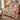 Yuletide Keepsake Patchwork quilt bedding set in pink on a bed in a bright bedroom