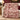 Personalized Yuletide Keepsake Patchwork woven blanket in burgundy draped on a sofa with sample family name The Thompsons above the toy train