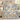 Blue floral lemon woven blanket draped on a sofa with Grandma's Garden title and eight sample names