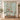 Personalized Weeping Cherry Bamboo Chinoiserie quilt hung on a wooden rod above a bench with 2 pillow shams and sample family name