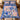 Swallow Iris Ribbon Ballet quilt bedding set with 2 matching pillowcases on a bed, flying swallows and blue irises
