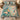 Kingfisher Waterlily Ribbons quilt bedding set with 2 matching pillowcases on a bed, kingfishers among peach waterlilies and blue irises