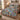 Partridge Pear Christmas quilt bedding set on a wooden bed in a bright bedroom