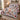 Christmas Dogs Poinsettia quilt bedding set on a wooden bed in a bright bedroom