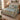 Birch Lake Wildflower Meadow quilt bedding set on a wooden bed in a bright bedroom