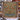Red Deer Tree of Life woven blanket displayed outdoors on a snowy wooden frame