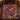 Red Navy Christmas Pudding woven blanket spread on a bed with tartan bedding