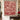 Red Poinsettia Legend Pattern woven blanket design shown without a name as a wall tapestry