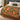 Red Squirrel Hazel Woodland woven blanket spread on a bed