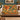 Red Squirrel Hazel Woodland woven blanket draped over a sofa