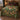 Red Toadstool Fern Wreath woven blanket spread on a bed