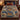 Road to Bethlehem Patchwork Quilt woven blanket with custom family name spread on a bed