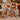 Robin Ribbon Parade Christmas photo collage fleece blanket on a sofa by the fireplace