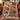 Robin Ribbon Parade Christmas photo blanket on an armchair, shown without a name