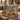 Rocky Mountain lake woven blanket draped over a sofa