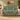 Sage Hellebore Ornament Christmas woven blanket draped over a sofa in a holiday living room