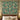 Sage Hellebore Ornament Christmas woven blanket displayed as a wall tapestry above a bed
