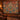 Saguaro Bloom Tree of Life woven blanket hanging as a wall tapestry in a cabin-style room