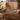 Sandhill crane sunrise woven blanket styled in a cozy autumn room