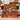 Santa workshop tartan fleece throw draped over a cream sofa