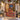 Scandinavian Christmas Hearth woven blanket displayed outdoors on a festive Christmas porch