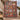 Scandinavian Christmas Mini Scenes woven blanket draped over a staircase banister with garland