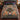 Scandinavian Christmas Straw Goat woven blanket spread on a blue bed in a Nordic cottage bedroom