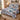 Snow Hare Enchanted Forest quilt bedding set with 2 matching pillowcases on a bed with holiday decor