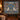 Snow Leopard Blue Poppy Pass Tree of Life woven blanket hanging as a wall tapestry in a cabin-style room