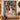 Snowman Lantern Walk family photo fleece throw displayed on a wall above a bench