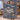 Holding a personalized Snowy Nordic Farmstead woven blanket with custom family name woven in